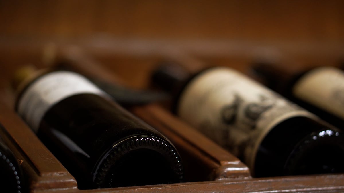 Bottles of wine displayed at a winery.