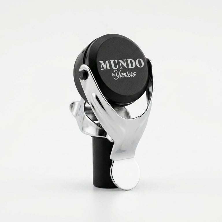 Black and white Mundo Juguetero branded spherical toy or device held in an articulated hand display mechanism